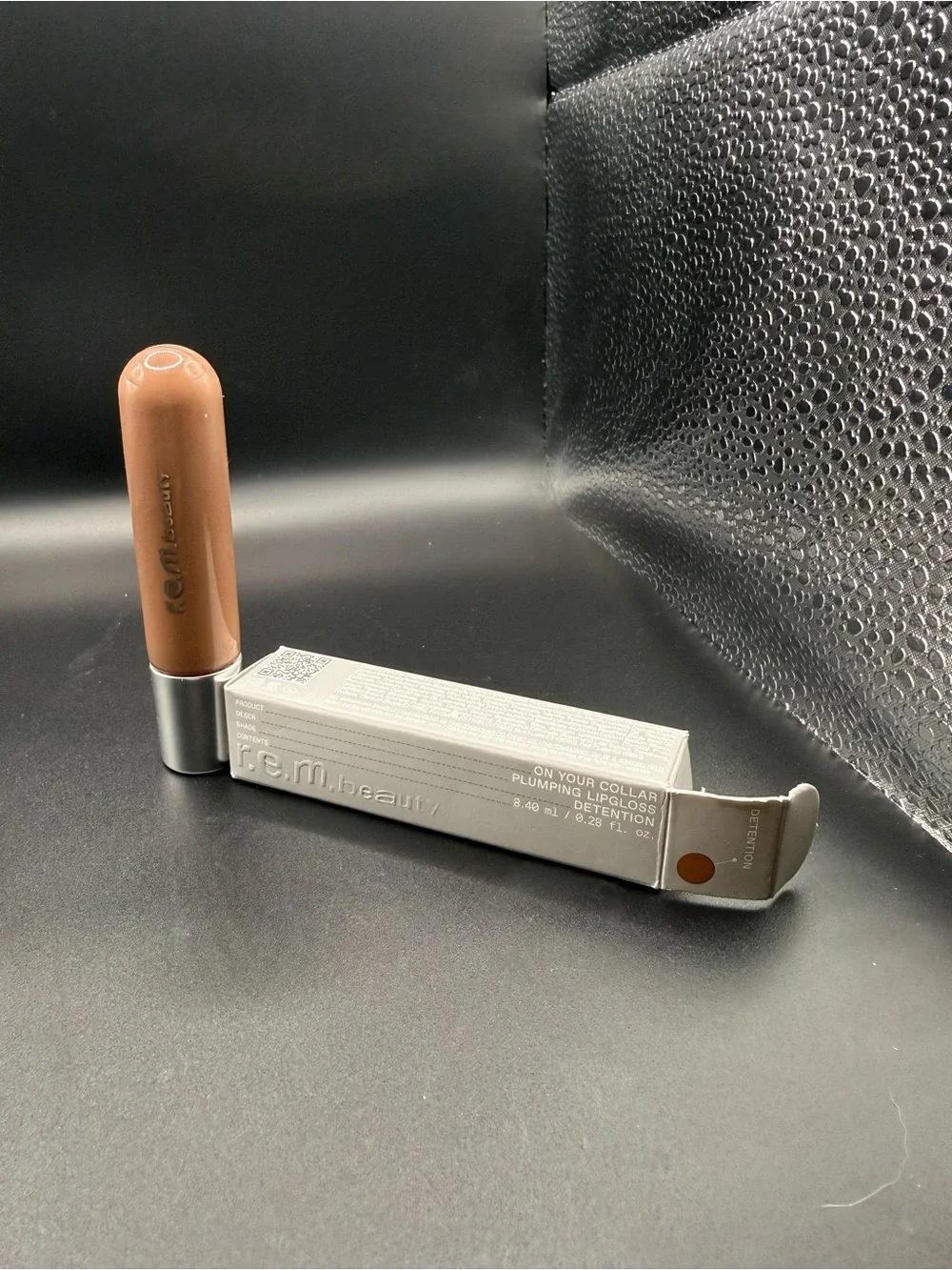 R.E.M Beauty on your collar plumping lipgloss—-Detention